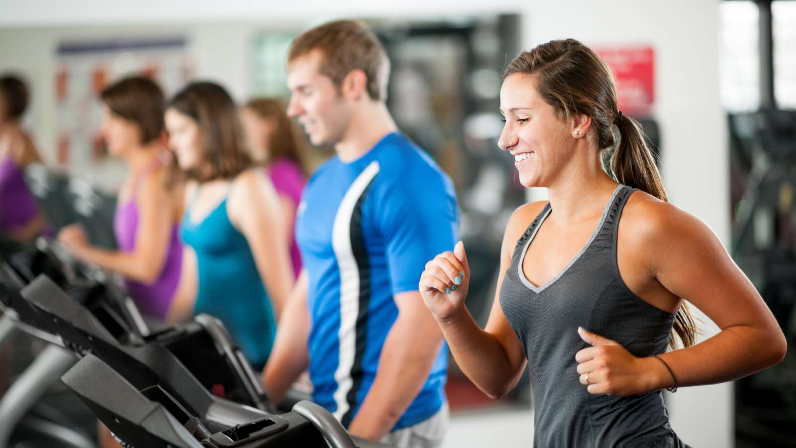 mom taking time at the gym to do a mom workout