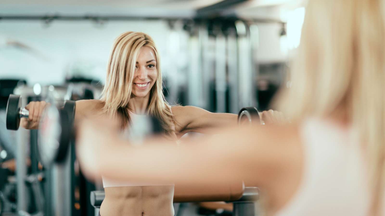 mom workout routine at the gym lifting weights