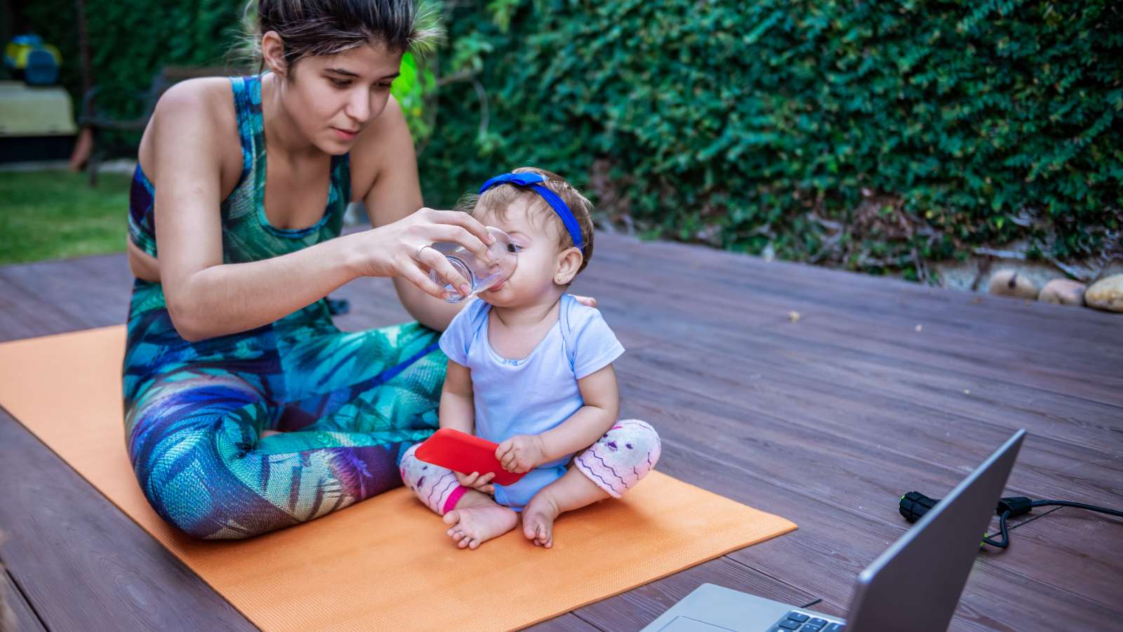 working mom working out with kids