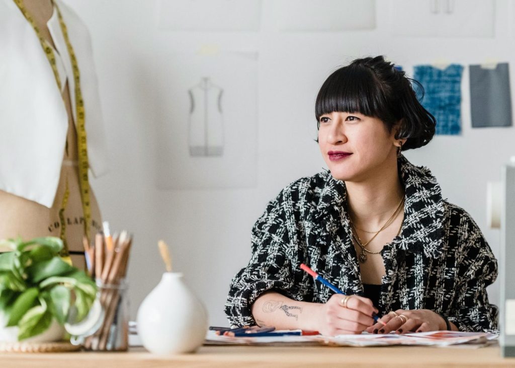 Creative designer working on side hustle from home